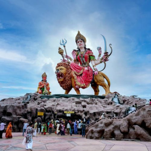 Vrindavan, Uttar pradesh, September 2022 : A Statue of Maa Vaishno Devi beautiful image of maa durga with lion sitting with hanumaan. Devotees going to the cave of Mata Vaishnodevi